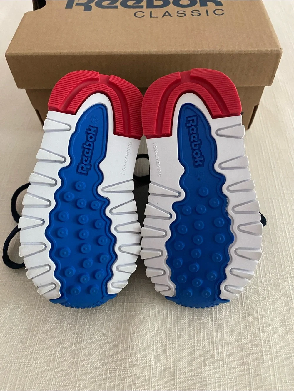 Reebok CL Leather Color Block Sneakers for babies.